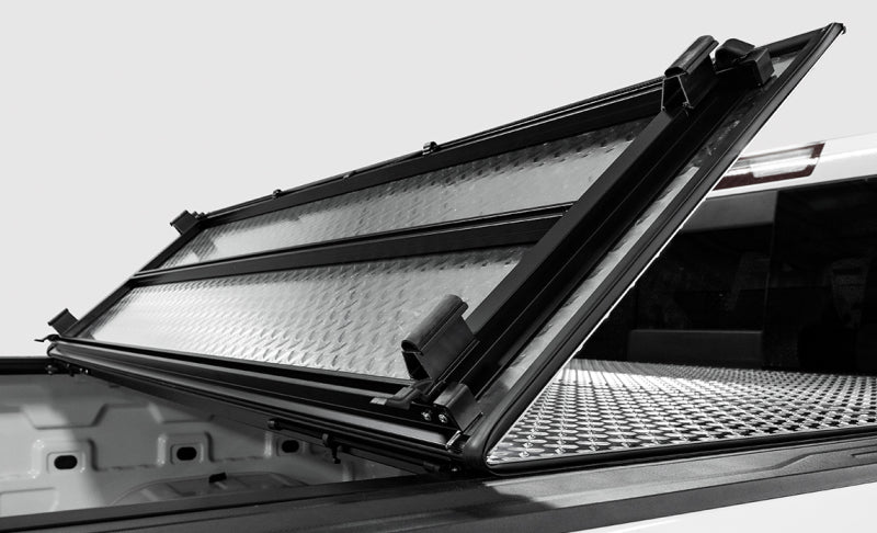 Access LOMAX Professional Series Tri-Fold Cover 04-18 Ford F-150 5ft 6in Short Bed Diamond Plate B0010019