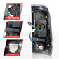 ANZO 1997-2003 Ford F-150 LED Tail Lights w/ Light Bar Black Housing Smoke Lens 311378