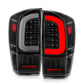 ANZO 16-21 Toyota Tacoma LED Tail Lights - w/ Light Bar Sequential Black Housing & Clear Lens 311400