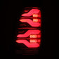 AlphaRex 05-15 Toyota Tacoma LUXX LED Taillights Blk/Red w/Activ Light/Seq Signal 680070 *Discontinued