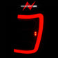ANZO 1999-2004 Jeep Grand Cherokee LED Tail Lights w/ Light Bar Black Housing Smoke Lens 311395